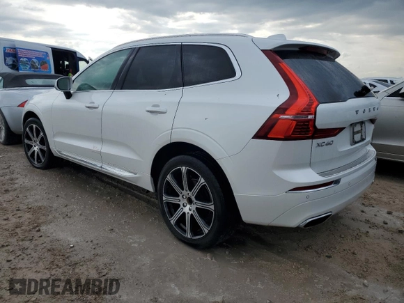 2020 Volvo XC60 Inscription z VIN YV4102DL9L1520715, wystawiony jako Copart lot #76833114 z przebiegiem 21 971 mil mil oraz Szkoda całkowita • Salvage title. Historia ofert i sprzedaży dostępna na DreamBid. Obrazek 2.