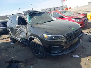 2020 Jeep Cherokee Latitude with VIN 1C4PJLCB2LD552784, listed as a IAAI auction lot 41908936 with 47,337 mi miles and . Bid and sale history available at DreamBid. Image 1.