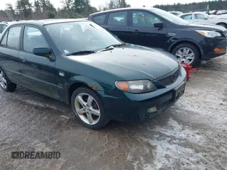 2003 Mazda Protege DX with VIN JM1BJ225431107903, listed as a IAAI auction lot 41549412 with 141,426 mi miles and . Bid and sale history available at DreamBid. Image 1.