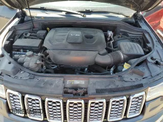 2017 Jeep Grand Cherokee Overland with VIN 1C4RJFCGXHC941983, listed as a Copart auction lot 52008825 with 65,776 mi miles and Salvage Title. Bid and sale history available at carsss.com. Image 11.