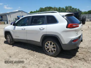 2014 Jeep Cherokee Latitude with VIN 1C4PJMCS6EW244336, listed as a Copart auction lot 52597835 with 167,266 mi miles and Salvage Title. Bid and sale history available at DreamBid. Image 2.