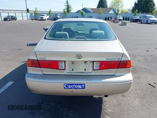 2000 Toyota Camry CE z VIN JT2BG22K2Y0440255, wystawiony jako IAAI lot #42088080 z przebiegiem 353 102 mil mil oraz . Historia ofert i sprzedaży dostępna na DreamBid. Obrazek 16.