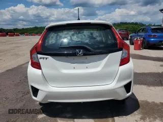 2015 Honda Fit LX z VIN 3HGGK5H59FM760585, wystawiony jako Copart lot #55737365 z przebiegiem 79 700 mil mil oraz Szkoda całkowita • Salvage title. Historia ofert i sprzedaży dostępna na DreamBid. Obrazek 6.