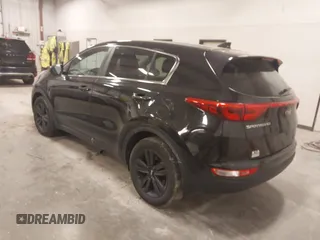 2018 Kia Sportage LX with VIN KNDPM3AC6J7417371, listed as a IAAI auction lot 41879390 with 112,944 mi miles and . Bid and sale history available at carsss.com. Image 3.