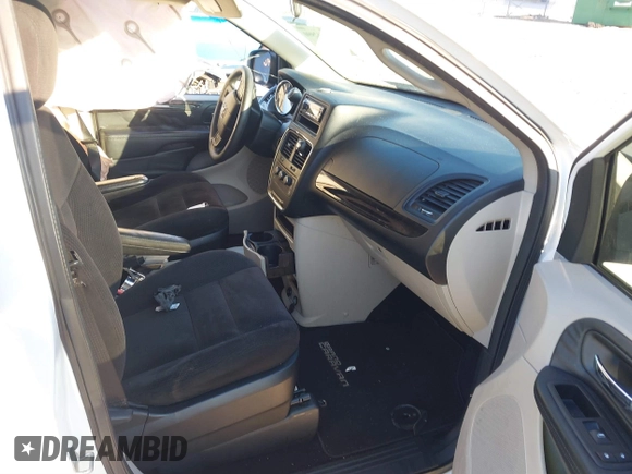 2014 Dodge Grand Caravan SE with VIN 2C4RDGBG1ER220534, listed as a IAAI auction lot 41262990 with 77,851 mi miles and . Bid and sale history available at DreamBid. Image 5.