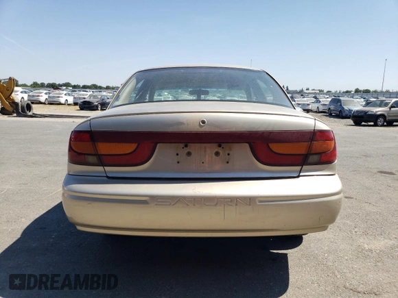 2000 Saturn SL with VIN 1G8ZK5274YZ103237, listed as a Copart auction lot 60558105 with 126,320 mi miles and Salvage title. Bid and sale history available at DreamBid. Image 6.