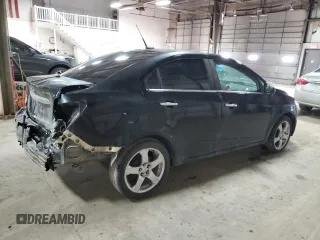 2012 Chevrolet Sonic LTZ z VIN 1G1JE5SH3C4151930, wystawiony jako Copart lot #84337574 z przebiegiem 125 606 mil mil oraz Szkoda całkowita • Salvage title. Historia ofert i sprzedaży dostępna na DreamBid. Obrazek 3.