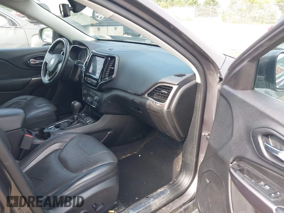 2019 Jeep Cherokee High Altitude with VIN 1C4PJMDX4KD260309, listed as a IAAI auction lot 42594817 with 63,664 mi miles and . Bid and sale history available at DreamBid. Image 5.