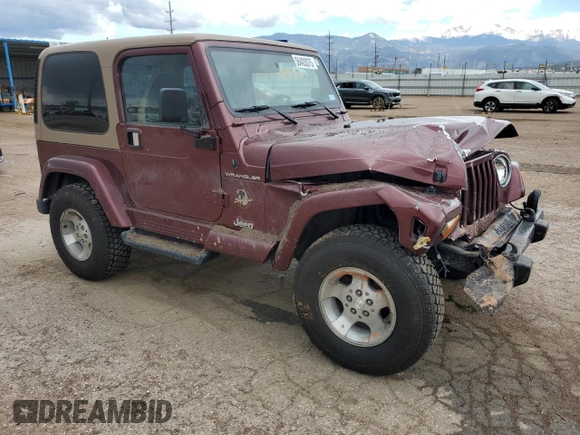 2002 Jeep Wrangler Sahara with VIN 1J4FA59S32P746410, listed as a Copart auction lot 56403075 with 147,968 mi miles and Salvage title. Bid and sale history available at DreamBid. Image 4.