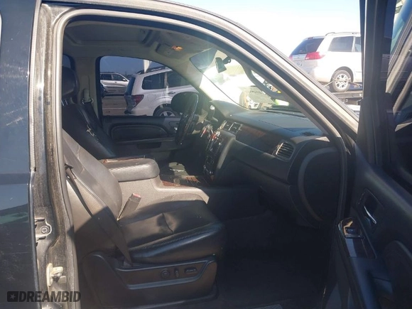 2010 GMC Yukon Denali with VIN 1GKUKEEF2AR235104, listed as a IAAI auction lot 41669918 with 133648 miles. Bid and sale history available at carsss.com. Image 5.