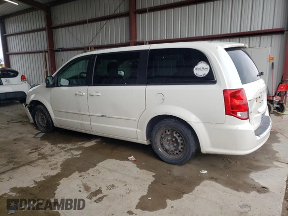 2011 Dodge Grand Caravan SXT with VIN 2D4RN4DG2BR768954, listed as a Copart auction lot 73469283 with 180,116 mi miles and Salvage Title. Bid and sale history available at DreamBid. Image 2.