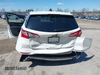2020 Chevrolet Equinox LT z VIN 3GNAXKEV4LS732572, wystawiony jako IAAI lot #41879305 z przebiegiem 50 036 mil mil oraz . Historia ofert i sprzedaży dostępna na DreamBid. Obrazek 6.