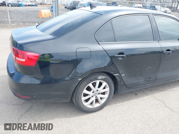 2015 Volkswagen Jetta Sedan 1.8T SE with VIN 3VWD17AJ0FM218263, listed as a IAAI auction lot 42083017 with 194,850 mi miles. Bid and sale history available at carsss.com. Image 6.