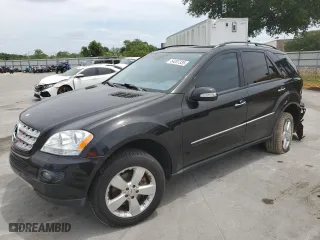 2006 Mercedes-Benz M-Class 5.0L with VIN 4JGBB75E56A122979, listed as a Copart auction lot 54207335 with 164,056 mi miles and Salvage Title. Bid and sale history available at carsss.com. Image 1.