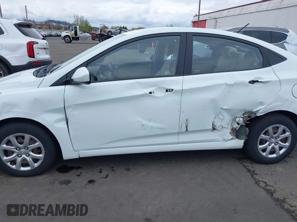 2013 Hyundai Accent GLS with VIN KMHCT4AE6DU291877, listed as a IAAI auction lot 41931876 with 136,781 mi miles. Bid and sale history available at carsss.com. Image 6.