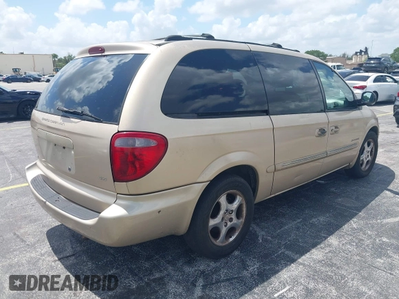 2001 Dodge Caravan ES with VIN 2B8GP54L51R198959, listed as a IAAI auction lot 41941050 with 208,396 mi miles and . Bid and sale history available at carsss.com. Image 4.
