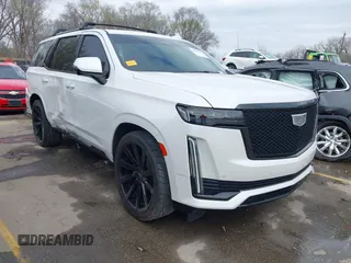 2022 Cadillac Escalade Sport Platinum z VIN 1GYS4GKL5NR215884, wystawiony jako IAAI lot #41860737 z przebiegiem 48 726 mil mil oraz . Historia ofert i sprzedaży dostępna na DreamBid. Obrazek 1.