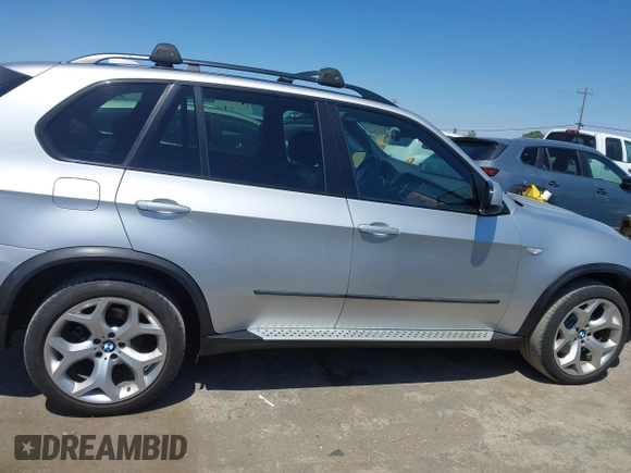 2012 BMW X5 35d with VIN 5UXZW0C58CL671141, listed as a IAAI auction lot 42644381 with 127,464 mi miles and . Bid and sale history available at DreamBid. Image 13.