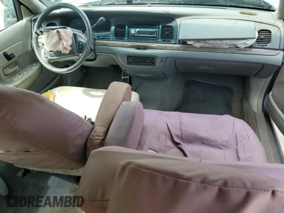 1998 Ford Crown Victoria LX с VIN 2FAFP74W3WX162752, выставлен на аукционе Copart как лот 72498904 с пробегом Не указан миль и Списание • Salvage title. История ставок и продаж доступна на DreamBid. Изображение 8.