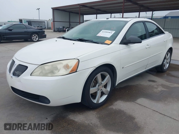 2006 Pontiac G6 GTP z VIN 1G2ZM551X64224909, wystawiony jako IAAI lot #42289564 z przebiegiem 193 418 mil mil oraz . Historia ofert i sprzedaży dostępna na DreamBid. Obrazek 19.