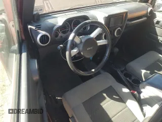 2010 Jeep Wrangler Sahara с VIN 1J4GA5D16AL225139, выставлен на аукционе Copart как лот 77114204 с пробегом Не указан миль и Списание • Salvage title. История ставок и продаж доступна на DreamBid. Изображение 8.
