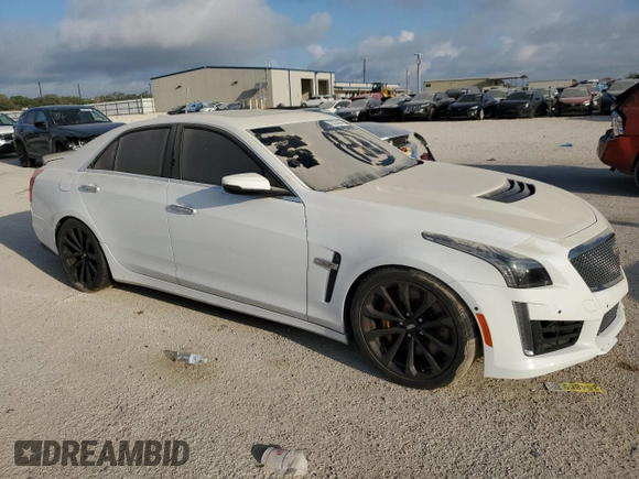 2017 Cadillac CTS-V z VIN 1G6A15S65H0216411, wystawiony jako Copart lot #72227484 z przebiegiem 57 241 mil mil oraz Szkody całkowita. Historia ofert i sprzedaży dostępna na DreamBid. Obrazek 4.