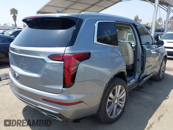 2023 Cadillac XT6 FWD Premium Luxury with VIN 1GYKPCRS6PZ163018, listed as a IAAI auction lot 42437403 with 21,366 mi miles and . Bid and sale history available at DreamBid. Image 4.