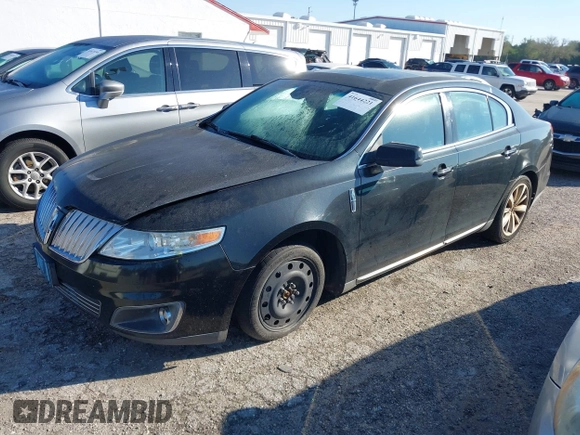 2009 Lincoln MKS with VIN 1LNHM94RX9G607947, listed as a IAAI auction lot 41644221 with 184,979 mi miles. Bid and sale history available at carsss.com. Image 2.