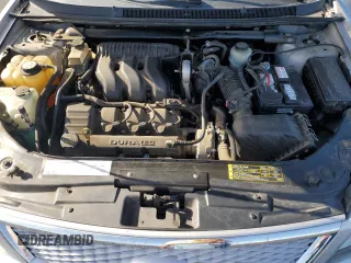 2005 Ford Five Hundred Limited z VIN 1FAHP28185G111858, wystawiony jako Copart lot #51687615 z przebiegiem 83 788 mil mil oraz Szkoda całkowita • Salvage title. Historia ofert i sprzedaży dostępna na DreamBid. Obrazek 13.