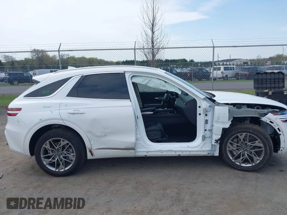 2024 Genesis GV70 2.5T with VIN 5NMMADTB8RH014051, listed as a IAAI auction lot 42016285 with 9,671 mi miles and . Bid and sale history available at DreamBid. Image 13.