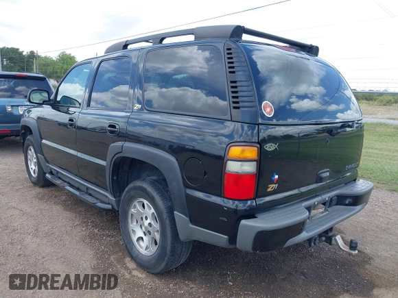 2004 Chevrolet Tahoe Z71 with VIN 1GNEK13ZX4R184775, listed as a IAAI auction lot 42433671 with 77,019 mi miles and . Bid and sale history available at DreamBid. Image 3.