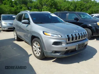 2014 Jeep Cherokee Latitude with VIN 1C4PJMCB4EW315520, listed as a IAAI auction lot 42034989 with 215,758 mi miles and . Bid and sale history available at carsss.com. Image 1.