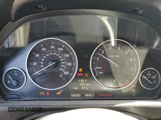 2015 BMW 4 Series 428i with VIN WBA4A5C5XFD410290, listed as a Copart auction lot 49067335 with 165,283 mi miles and Clean Title. Bid and sale history available at DreamBid. Image 9.