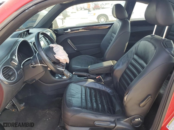 2012 Volkswagen Beetle 2.0T Turbo PZEV with VIN 3VWVA7AT5CM645469, listed as a Copart auction lot 78313174 with 136,859 mi miles and Salvage Title. Bid and sale history available at carsss.com. Image 7.