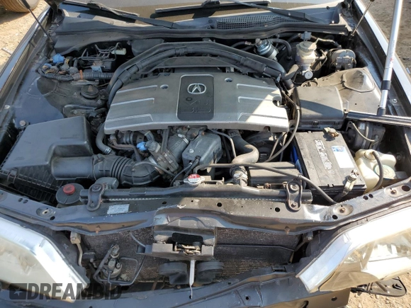 2002 Acura RL with VIN JH4KA96512C013028, listed as a Copart auction lot 71436914 with 142,527 mi miles and Salvage Title. Bid and sale history available at carsss.com. Image 11.