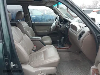 2000 Toyota 4Runner Limited with VIN JT3HN87R6Y0265299, listed as a IAAI auction lot 41569862 with 216,917 mi miles. Bid and sale history available at carsss.com. Image 5.