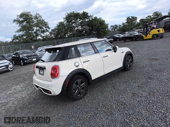 2021 MINI Hardtop 4 Door Cooper S with VIN WMWXU9C09M2P43346, listed as a Copart auction lot 68969854 with 22,394 mi miles and Salvage title. Bid and sale history available at DreamBid. Image 4.
