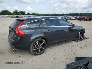 2015 Volvo V60 z VIN YV1902SS6F1227756, wystawiony jako Copart lot #57962725 z przebiegiem 62 542 mil mil oraz Szkoda całkowita • Salvage title. Historia ofert i sprzedaży dostępna na DreamBid. Obrazek 3.