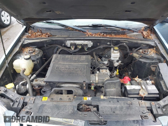 2010 Mercury Mariner with VIN 4M2CN9BG3AKJ30058, listed as a IAAI auction lot 42198715 with 81,402 mi miles and . Bid and sale history available at DreamBid. Image 10.