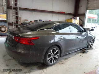 2016 Nissan Maxima 3.5 Platinum with VIN 1N4AA6APXGC447613, listed as a IAAI auction lot 40048427 with 100,142 mi miles. Bid and sale history available at carsss.com. Image 4.