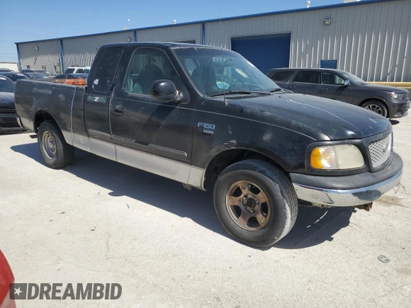 2000 Ford F-150 XL with VIN 1FTRX17L1YKA97900, listed as a Copart auction lot 48758555 with 220,834 mi miles and Clean Title. Bid and sale history available at carsss.com. Image 4.