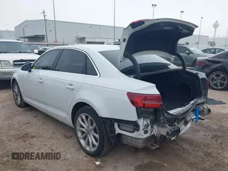 2019 Audi A4 Premium z VIN WAUGMAF4XKN004563, wystawiony jako IAAI lot #41637446 z przebiegiem 19 748 mil mil oraz . Historia ofert i sprzedaży dostępna na DreamBid. Obrazek 3.
