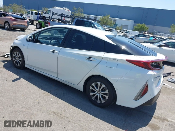 2021 Toyota Prius LE z VIN JTDKAMFP3M3187644, wystawiony jako IAAI lot #42443171 z przebiegiem 126 977 mil mil oraz . Historia ofert i sprzedaży dostępna na DreamBid. Obrazek 3.