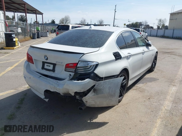 2015 BMW 5 Series 535i with VIN WBA5B1C58FG128061, listed as a IAAI auction lot 41838117 with 97,131 mi miles and . Bid and sale history available at carsss.com. Image 4.