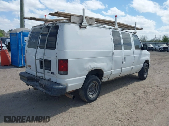 2013 Ford Econoline Cargo Commercial with VIN 1FTSE3EL4DDA38215, listed as a IAAI auction lot 41627924 with 181,821 mi miles. Bid and sale history available at carsss.com. Image 4.