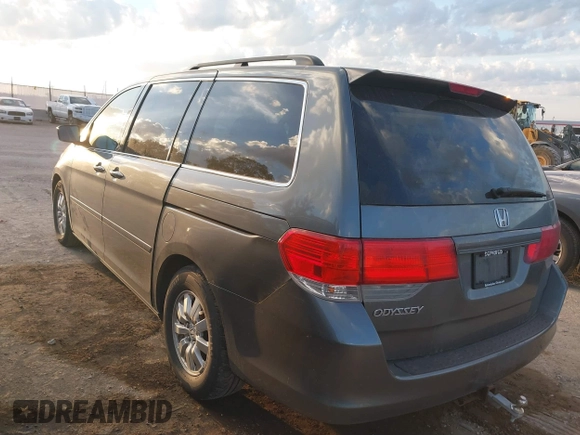 2010 Honda Odyssey EX-L with VIN 5FNRL3H70AB074913, listed as a IAAI auction lot 40142162 with 210,771 mi miles and . Bid and sale history available at DreamBid. Image 3.