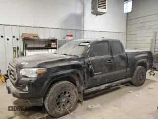 2020 Toyota Tacoma SR with VIN 5TFSZ5AN6LX225797, listed as a Copart auction lot 88536985 with 107,704 mi miles and Salvage title. Bid and sale history available at DreamBid. Image 1.