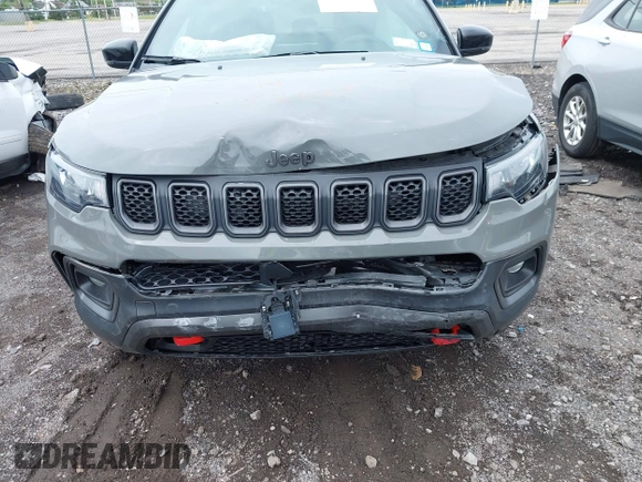 2023 Jeep Compass Trailhawk with VIN 3C4NJDDNXPT562694, listed as a IAAI auction lot 42370873 with 21,988 mi miles and . Bid and sale history available at DreamBid. Image 6.
