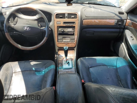 2004 Hyundai XG z VIN KMHFU45E64A320817, wystawiony jako Copart lot #58951955 z przebiegiem 179 978 mil mil oraz Nie do naprawy • Non repairable. Historia ofert i sprzedaży dostępna na DreamBid. Obrazek 8.