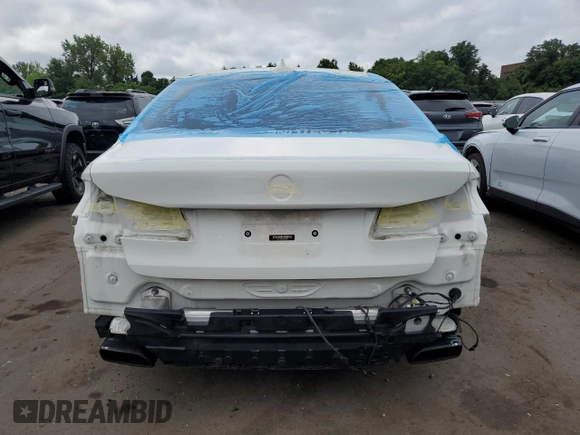 2018 BMW 5 Series M550i xDrive with VIN WBAJB9C5XJB035996, listed as a Copart auction lot 61459425 with Not provided miles and Salvage title. Bid and sale history available at DreamBid. Image 6.